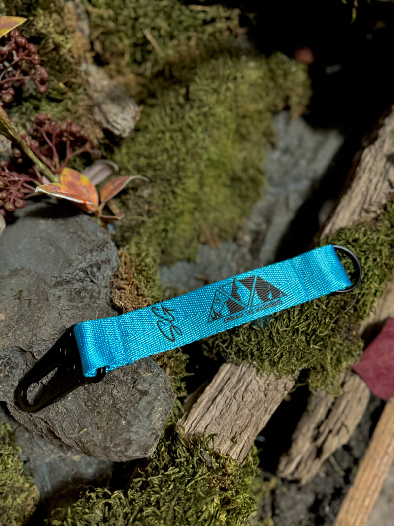 Load image into Gallery viewer, Embrace The Wilderness Nylon Keychain
